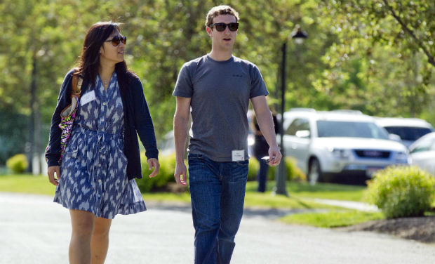 Mark Zuckerberg, president and CEO of Facebook, walks with Priscilla Chan during the 2011 Allen and Co. Sun Valley Conference, in Sun Valley, Idaho. Zuckerberg and his wife Chan were the most generous American philanthropists in 2013, with a Mark Zuckerberg, president and CEO of Facebook, walks with Priscilla Chan during the 2011 Allen and Co. Sun Valley Conference, in Sun Valley, Idaho. Zuckerberg and his wife Chan were the most generous American philanthropists in 2013, with a
